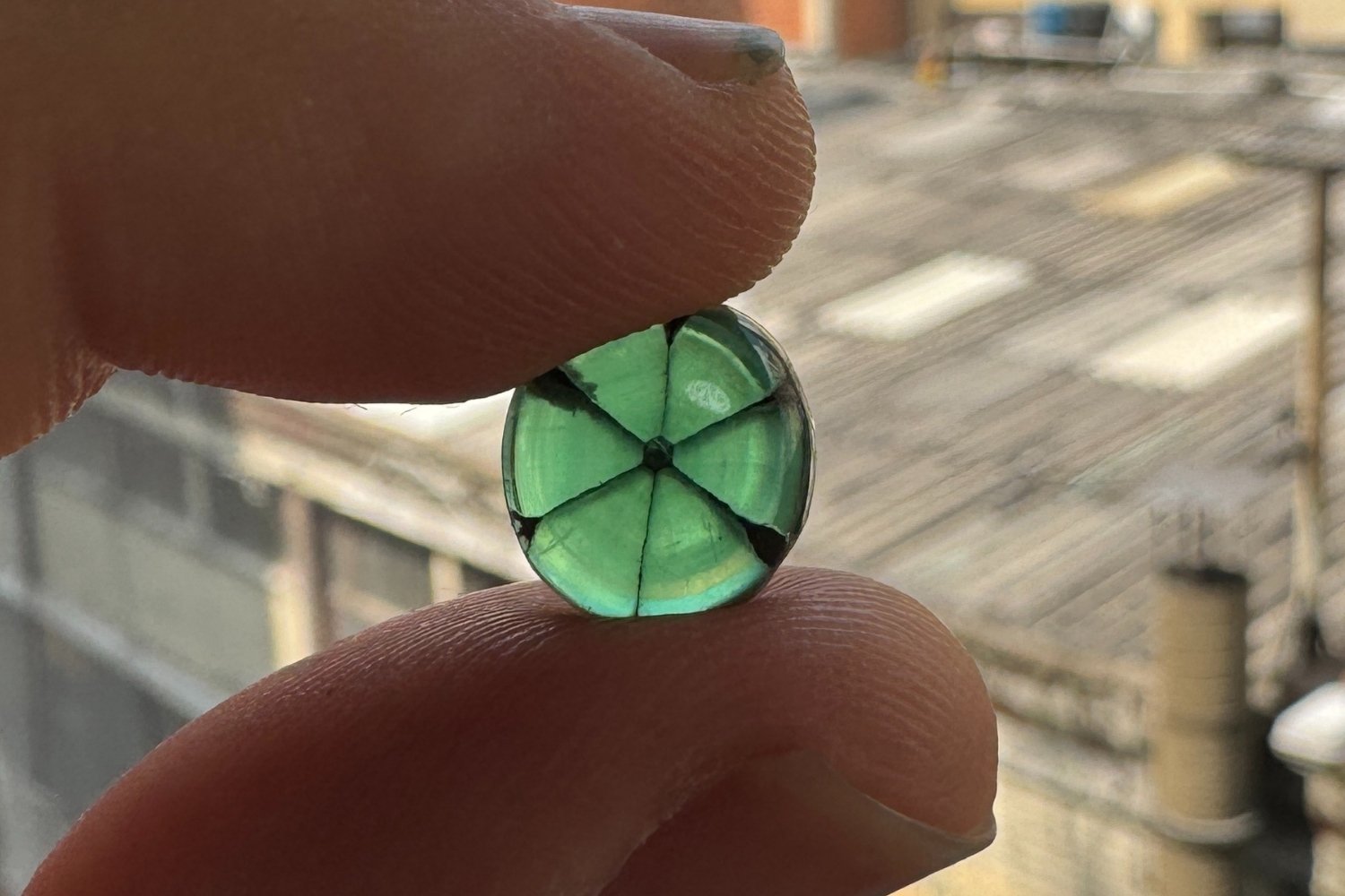 Trapiche colombian emerald showing six-ray star pattern and vivid green color